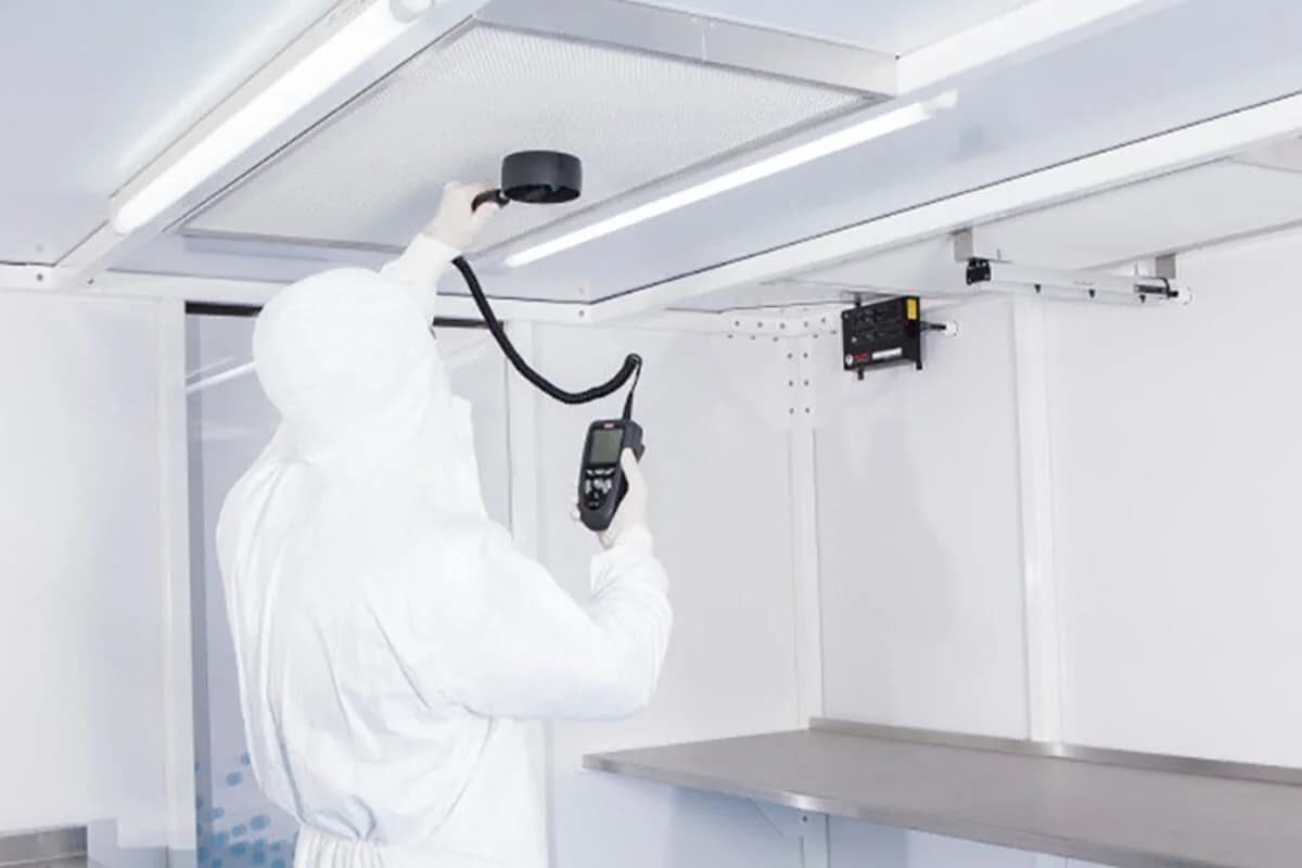 MAP Filters technician testing an installed ceiling HEPA filter during cleanroom validation