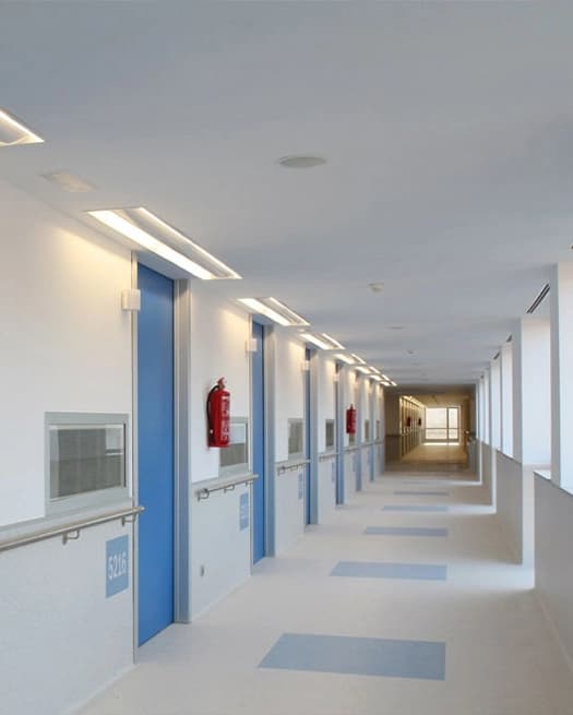 Completed cleanroom corridor with sealed doors and epoxy flooring